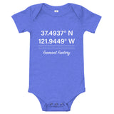 Tesla inspired apparel. Fremont Gigafactory GPS coordinates. Birthplace Fremont image centered on baby onesie.