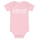 Tesla inspired apparel.  Elon Musk missing deadlines since day one. Deadlines image centered on baby onesie.