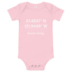 Tesla inspired apparel. Fremont Gigafactory GPS coordinates. Birthplace Fremont image centered on baby onesie.