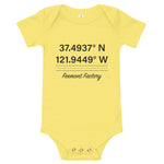 Tesla inspired apparel. Fremont Gigafactory GPS coordinates. Birthplace Fremont image centered on baby onesie.