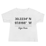 Tesla inspired apparel. Texas Gigafactory GPS coordinates. Birthplace Texas image centered on baby t-shirt.